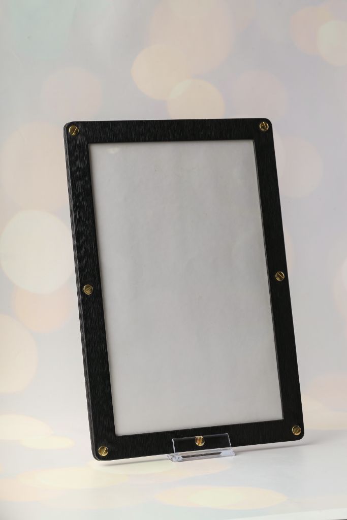 Menu — black MDF chalkboard blank, gold metal corner bolts, acrylic stand