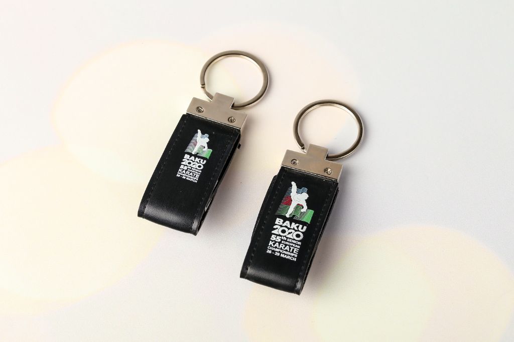 Baku 2020 leather USB keyring — 55th Senior European Karate Championships, black leather, metal ring, championship logo