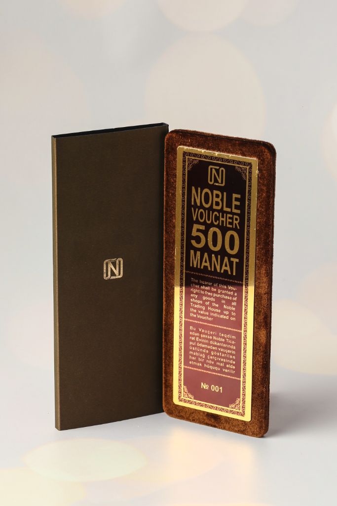 Noble Voucher 500 Manat — open view, velvet voucher beside brown cover
