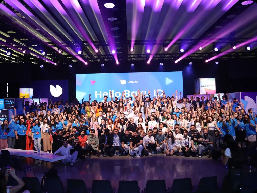 Baku ID 2024 group photo — all 1000+ participants in front of LED stage