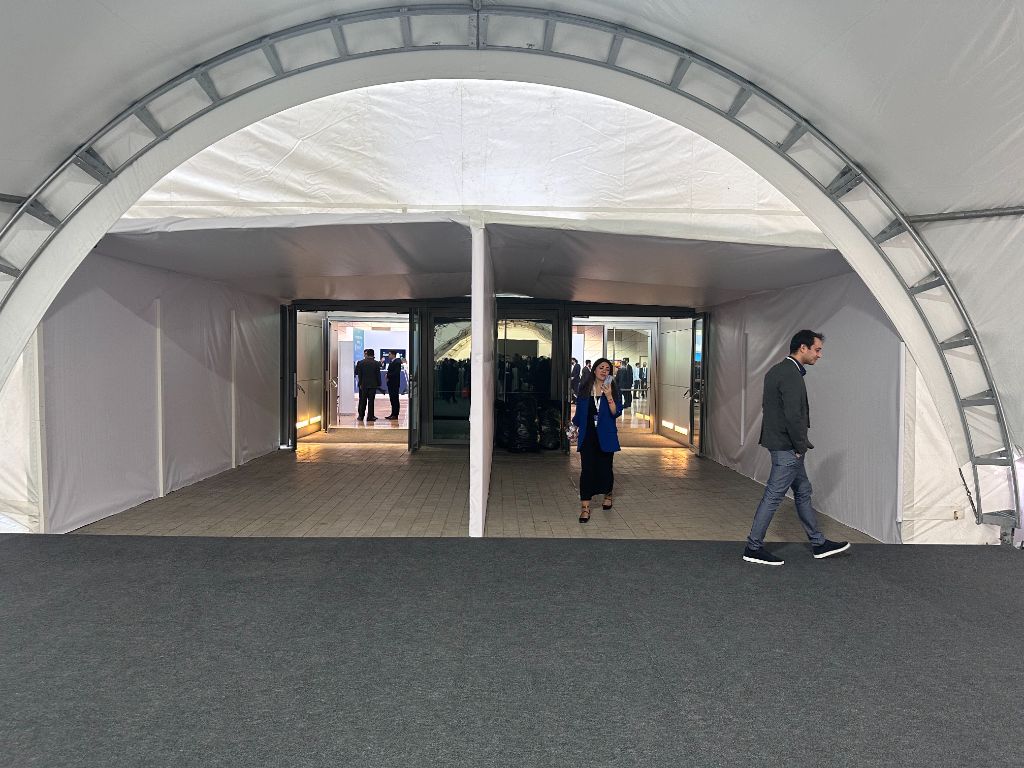 INMerge 2024 dome tent interior — arch entry corridor into BCC