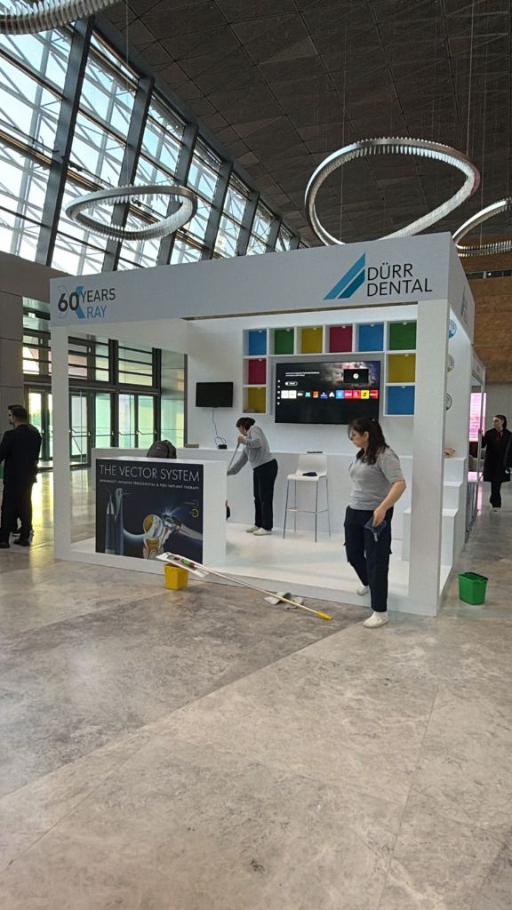 Dürr Dental stand — final pre-opening day cleaning