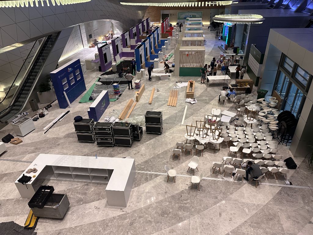 Build phase — panoramic view of exhibition hall during construction